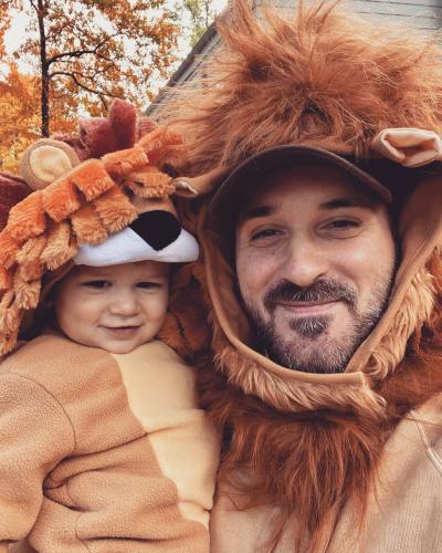 Matt and his son dressed as lions for Halloween